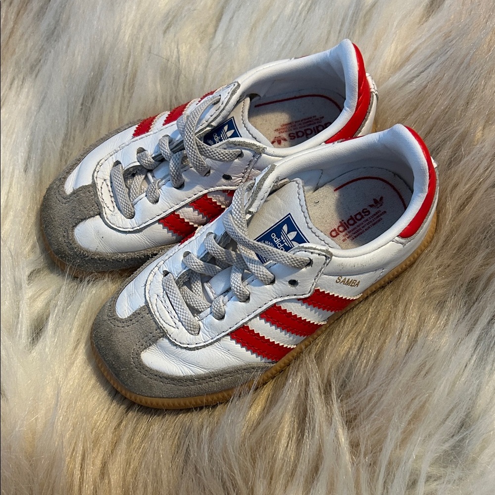 White and red Adidas samba
